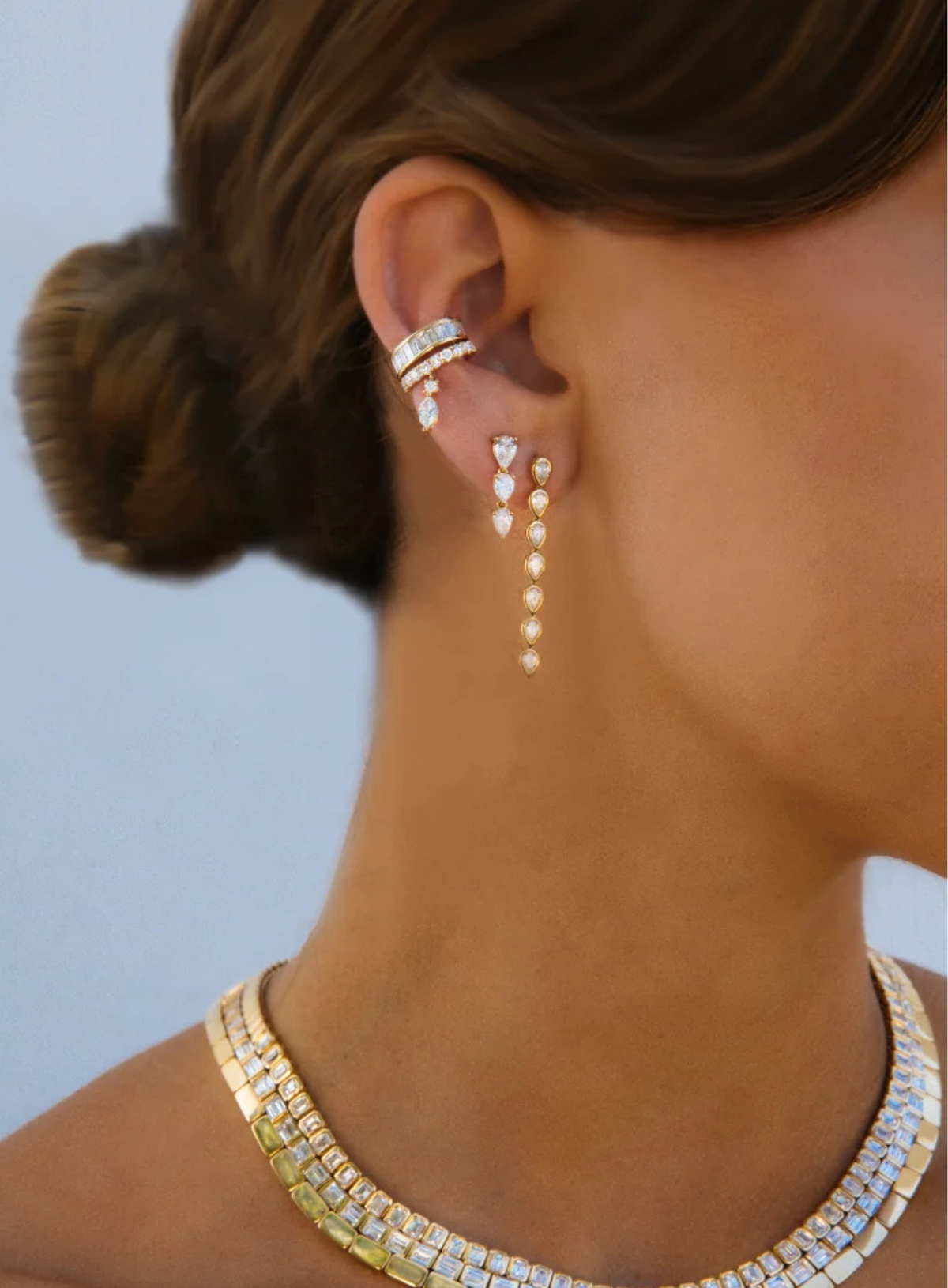 Tre Graduated Pear Diamond Drop Earrings